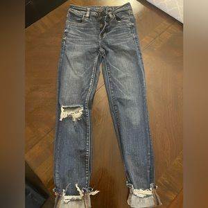 AE HIGH WAISTED NEXT LEVEL STRETCH JEANS